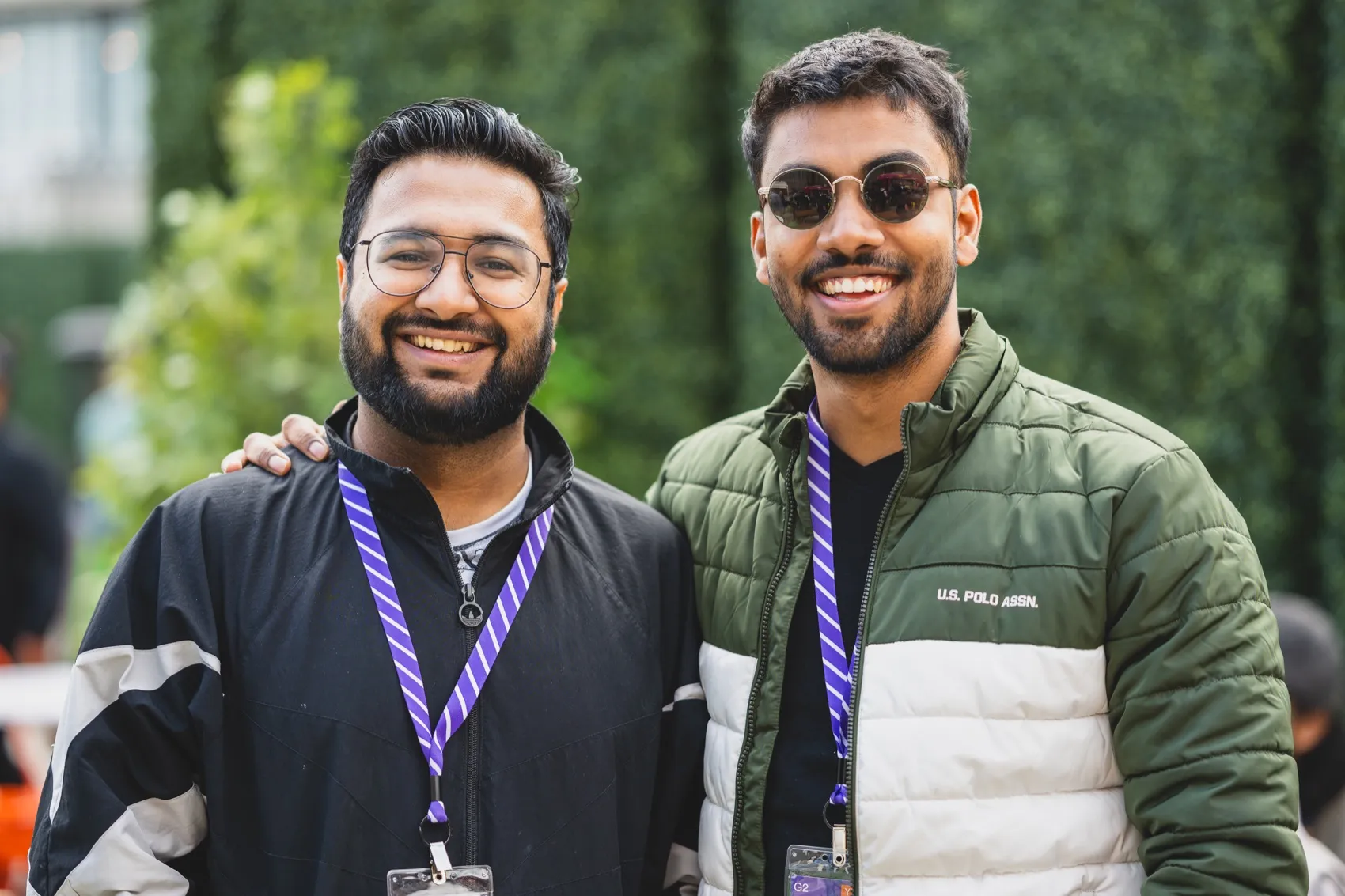 With a fellow founder